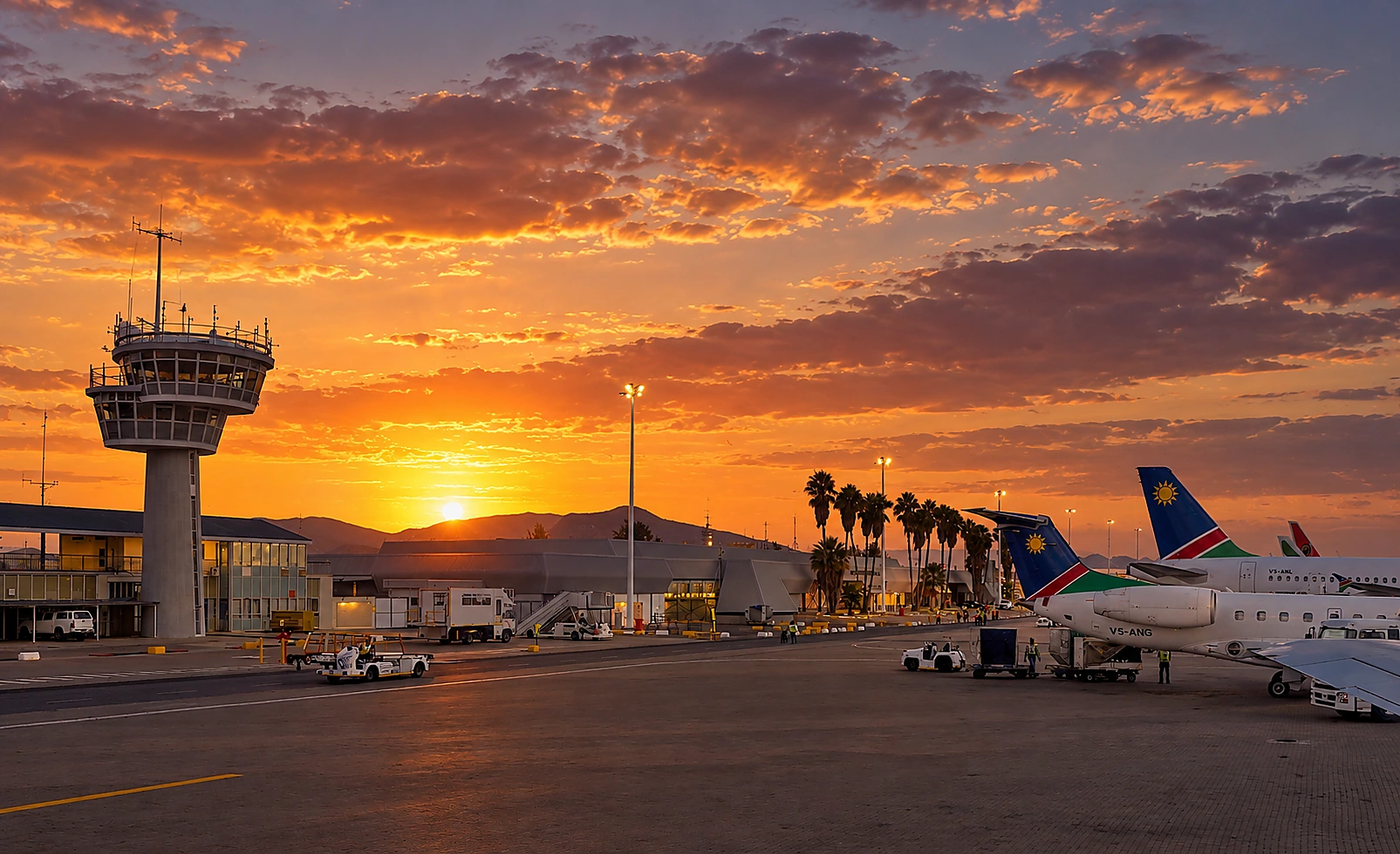 Hosea Kutako International Airport in Namibia at sunset with aircraft on the apron